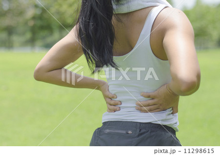 asian woman experiencing backache after exercise 11298615