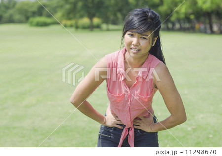 Young woman with stomach ache 11298670