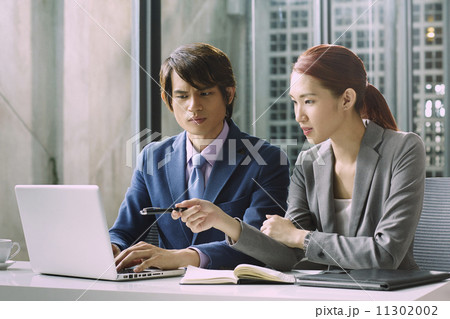 Business People Having Meeting Around 11302002