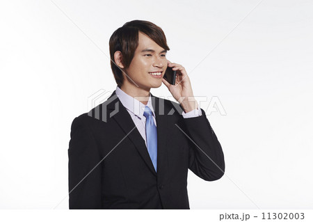 Portrait of Handsome Businessman Isolated on White Background Portrait of Handsome Businessman Isolated on White Background 11302003