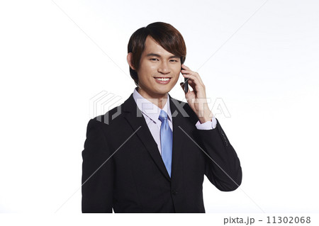 Portrait of Handsome Businessman Isolated on White Background 11302068