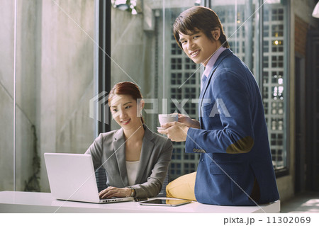 Business People Having Meeting Around 11302069