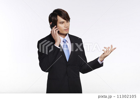 Portrait of Handsome Businessman Isolated on White Background 11302105