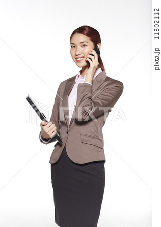 Portrait of Beautiful Businesswoman Isolated on White Background 11302112