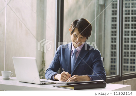 Young Business Man In Modern Office 11302114