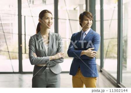 Young Business Partners in Urban Setting 11302144