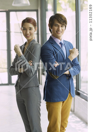 Young Business Partners in Urban Setting 11302169