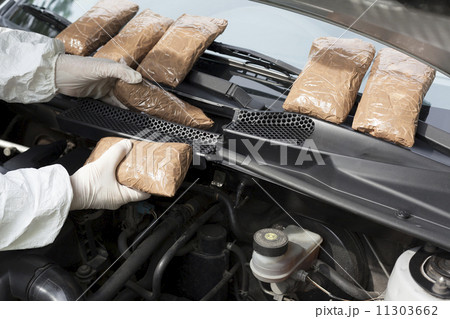 Drug smuggled in a car's engine compartment 11303662