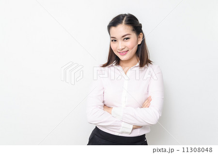 Portrait of smiling business woman, isolated on white background 11308048