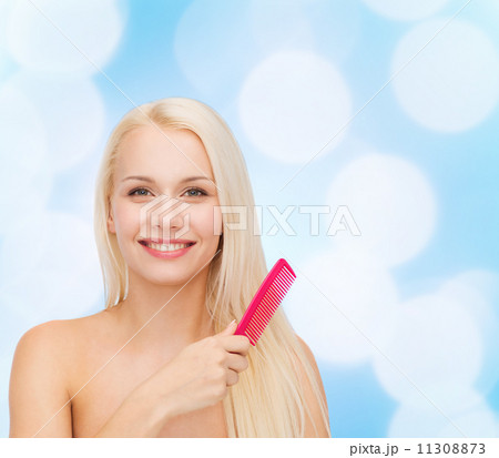 smiling woman with hair brush smiling woman with hair brush 11308873