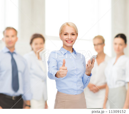young smiling businesswoman with smartphone young smiling businesswoman with smartphone 11309152