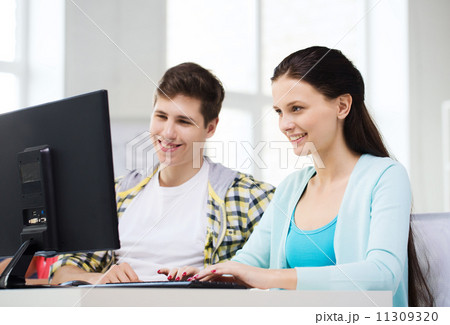 two smiling students having discussion two smiling students having discussion 11309320