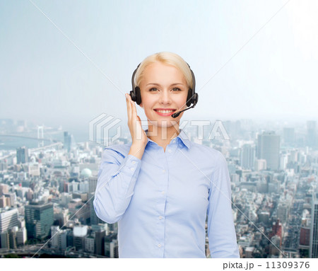 friendly female helpline operator 11309376