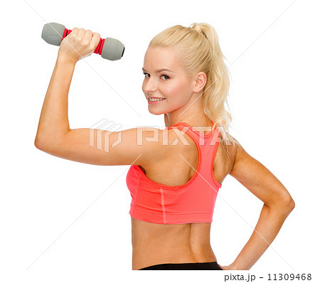 young sporty woman with light dumbbell young sporty woman with light dumbbell 11309468