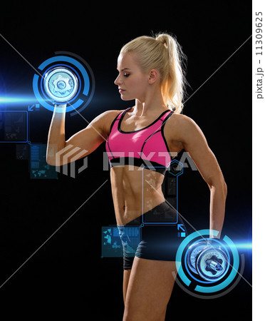 sporty woman with heavy steel dumbbells sporty woman with heavy steel dumbbells 11309625