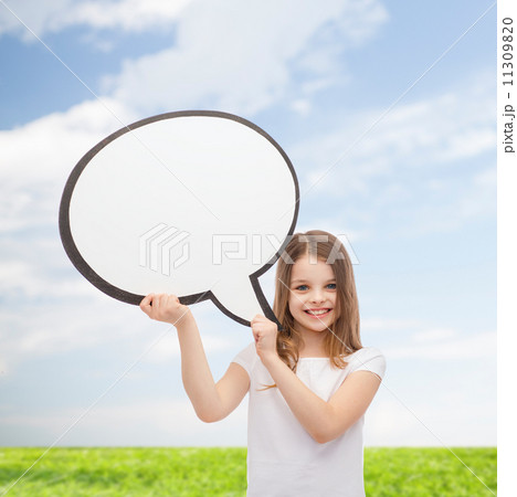 smiling little girl with blank text bubble 11309820