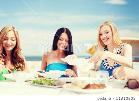 girls in cafe on the beach girls in cafe on the beach 11310805