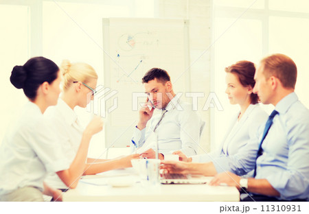 stressed male boss on business meeting 11310931