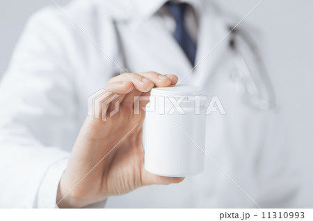 doctor hands holding white pack doctor hands holding white pack 11310993