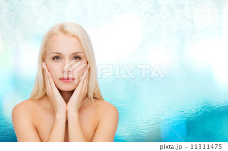 face of beautiful woman touching her face skin face of beautiful woman touching her face skin 11311475
