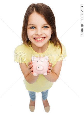 beautiful little girl with piggy bank 11312131