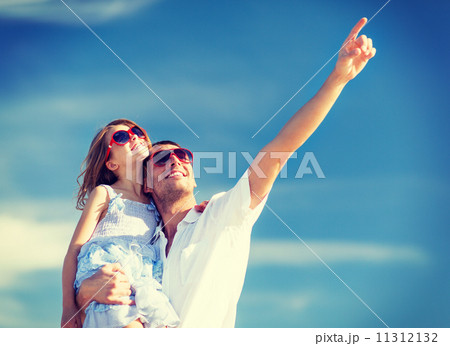 happy father and child in sunglasses over blue sky happy father and child in sunglasses over blue sky 11312132