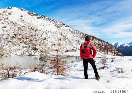 Hiker Winter Mountain Lake 11313664