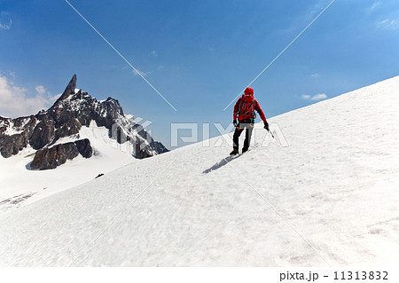 A male mountaineer on the way for reach the summit 11313832