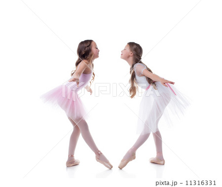 Amusing ballerinas posing looking at each other 11316331