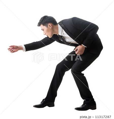 Asian business man posing tug of war Asian business man posing tug of war 11317287