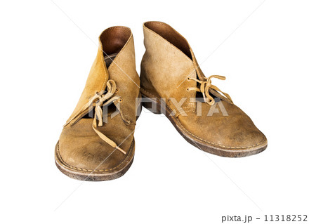 old yellow boots Isolated on white background 11318252