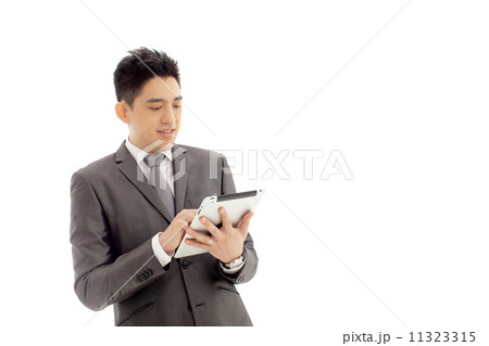 Businessman with Tablet Businessman with Tablet 11323315