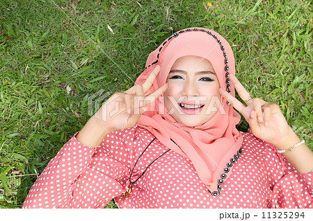 Beautiful muslim girl pink hijab wearing fashion Beautiful muslim girl pink hijab wearing fashion 11325294