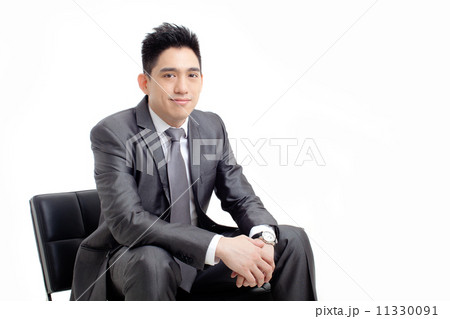 Businessman Sitting and Smiling 11330091