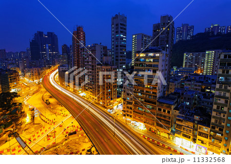 Colorful city night with lights of cars motion blurred in hong k 11332568