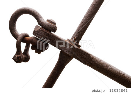 Closeup fragment of an old rusty boat anchor isolated on white 11332841