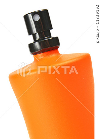 orange small bottle with a perfume liquid 11339192