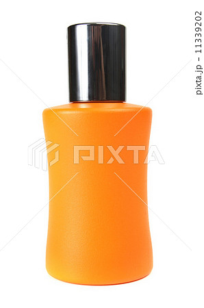 orange small bottle with a perfume liquid 11339202