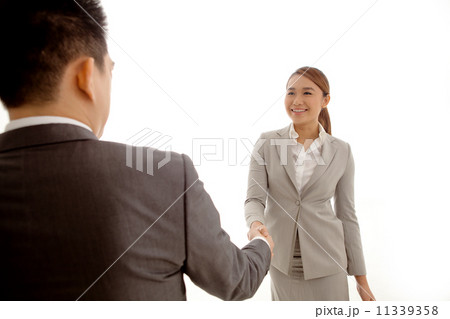 Businesswoman Shaking Hands 11339358