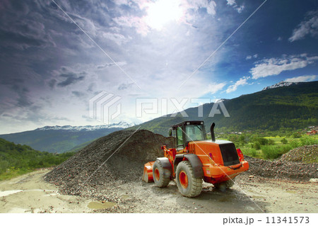 excavator in alps 11341573