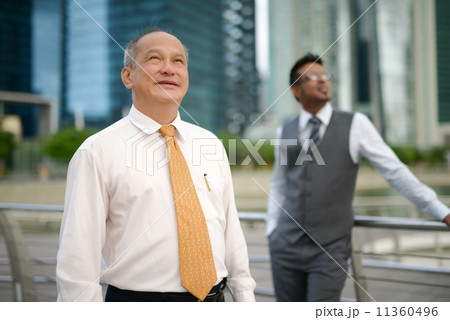 Businessman in city 11360496