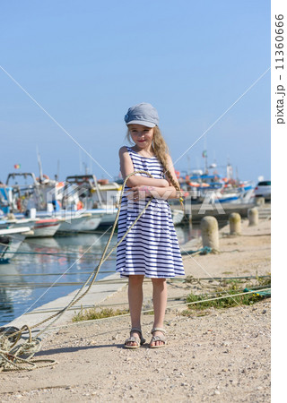 Adorable little girl at fisherman village Adorable little girl at fisherman village 11360666