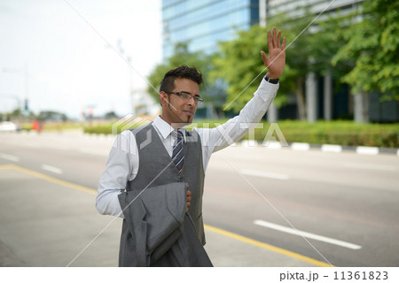 Businessman flagging for cab 11361823