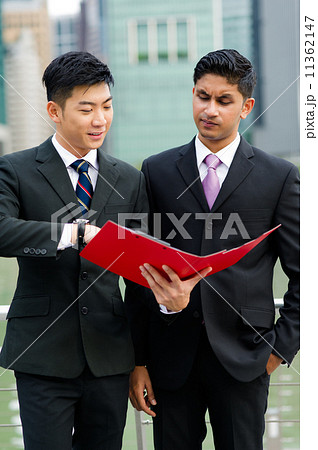 Businessman is considering the proposal shared by his financial advisor 11362147