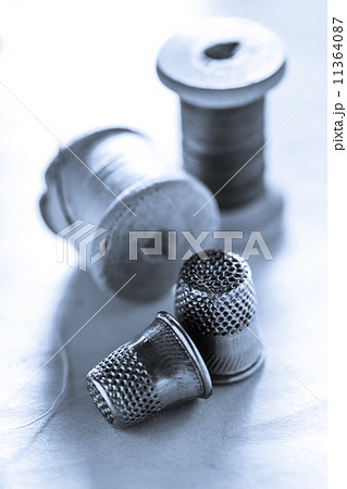 Thread bobbins and sewing thimbles Thread bobbins and sewing thimbles 11364087