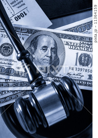 Wooden gavel and dollar Wooden gavel and dollar 11364159