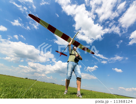 Man launches into the sky RC glider 11368124