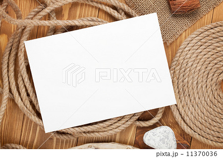Blank photo frame with ship rope 11370036