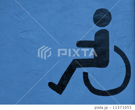 the symbol handicapped on blue wall background 11371055