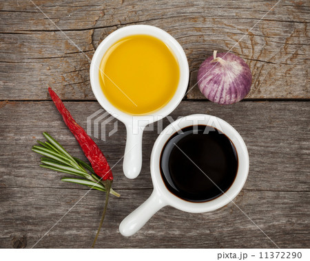 Olive oil and vinegar with spices Olive oil and vinegar with spices 11372290